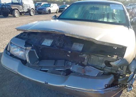 1999 Mercury Grand Marquis Gs из США, поврежденный, VIN 2MEFM74WXXX703928